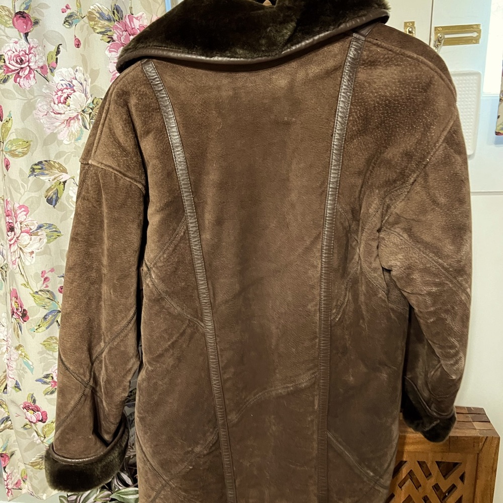 Heavy warm Suede coat.. barely worn still feels stiff